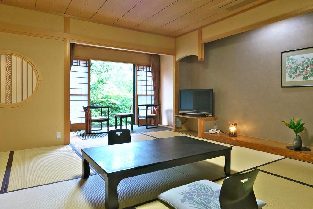 Yuraku Hotel Awara Стая снимка